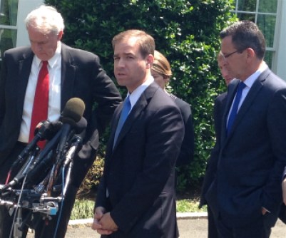 Hartford Mayor Luke Bronin, at microphone, and Gov. Dannel P. Malloy at the White House Tuesday.