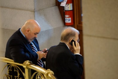 It was a night of phone calls and text messages for Sen. Martin M. Looney and his chief of staff, Vinnie Mauro.