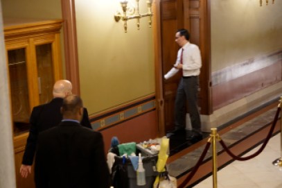 The governor's chief of staff, Brian Durand, heads to his office for bad news from the Senate.