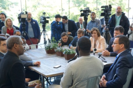 Gov. Dannel P. Malloy's roundtable talk was a media event. 