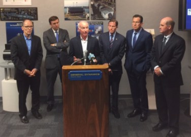 U.S. Rep Joe Courtney, D-2nd District, speaks during a visit to Electric Boat by U.S. Labor Secretary Thomas Perez, at far left. Others, left to right, are U.S. Sens. Chris Murphy and Richard Blumenthal, Gov. Dannel P. Malloy and EB President Jeffrey Geiger. The labor department has provided a number of grants to boost training for employees at EB.