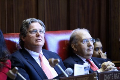 Sen. Ted Kennedy Jr. (left) and Senate President Pro Tem Martin Looney watch the vote board overhead.