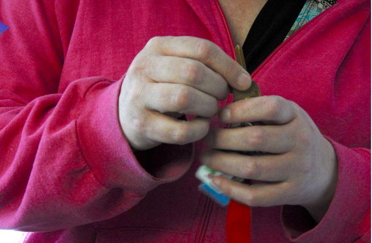 Pajo with the key to her home.