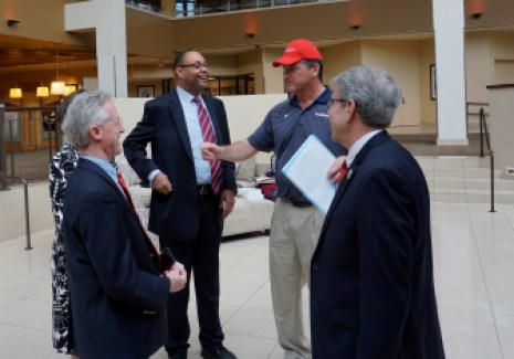 August Wolf, in a red cap inspired by Donald J. Trump, sought signatures from diners at the Prescott Bush dinner last month.