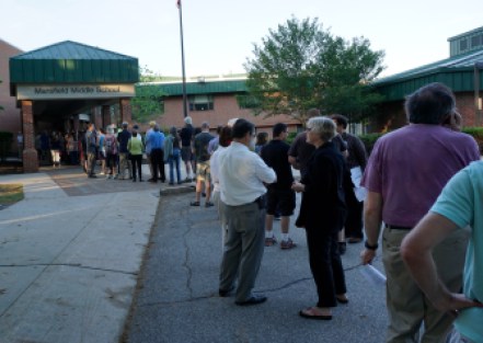 Democrats waiting in line to enter the Sanders caucus in Mansfield.
