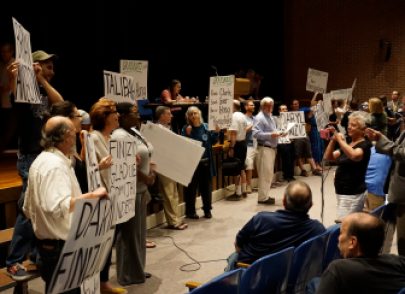 Supporters of rival delegate slates at the Bernie Sanders' caucus in Mansfield.