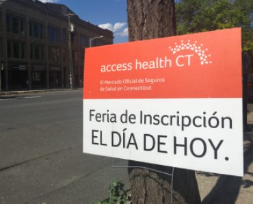 A sign outside the first transition enrollment fair in Danbury