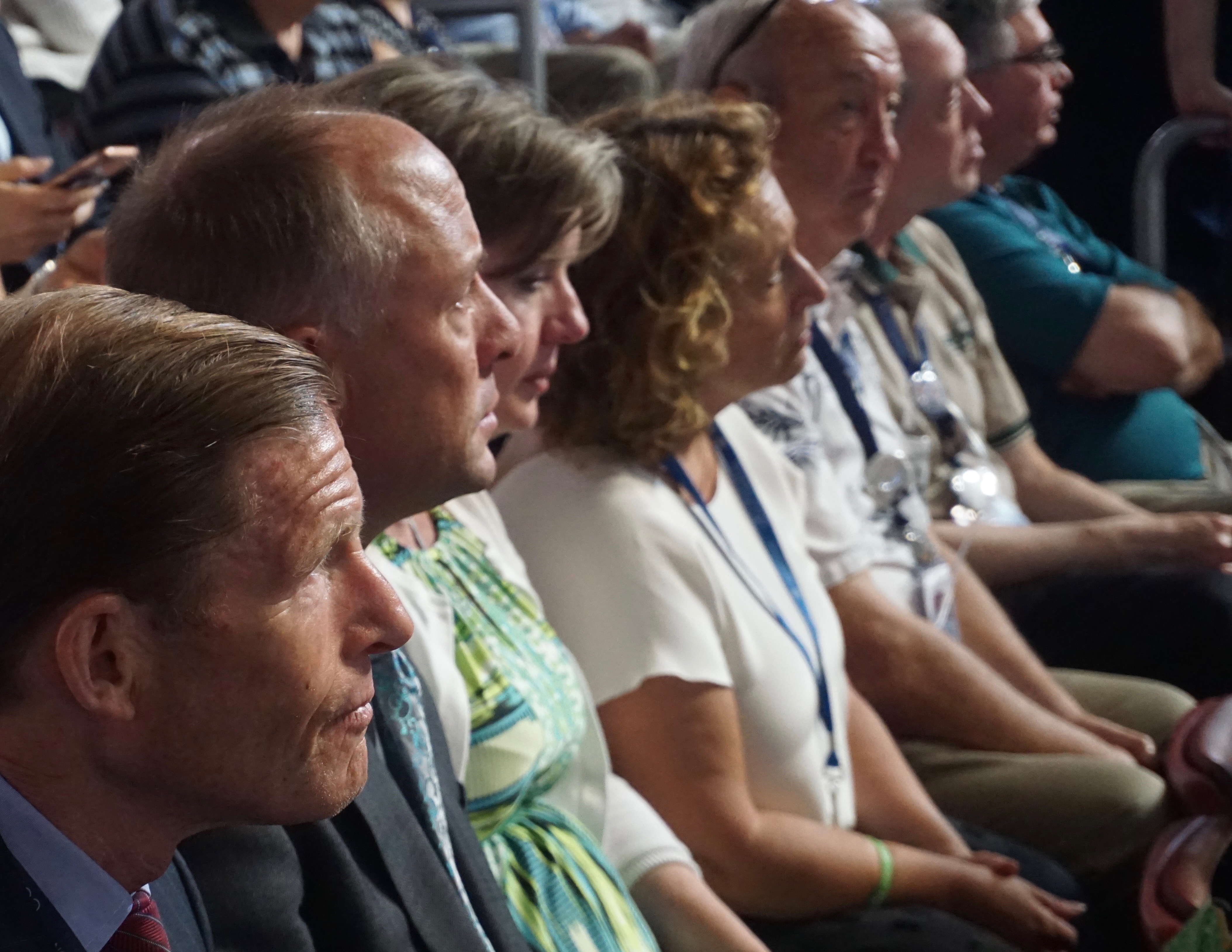 Watching Sen. Chris Murphy's speech are, left to right, Sen. Richard Blumenthal; Mark and Jackie Barden, whose 7-year-old son Daniel was killed at Sandy Hook; and documentarian Kim Snyder, whose film "Newtown" on the Sandy Hook massacre was screened in Philadelphia Wednesday.