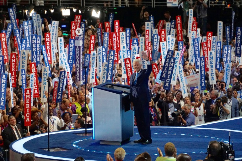Bill Clinton makes an entrance.