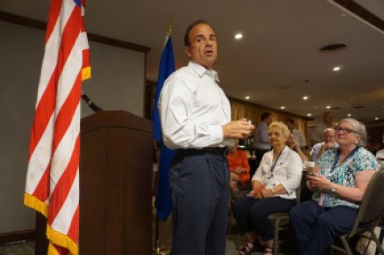 Joseph P. Ganim talks to his fellow delegates.