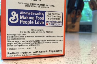 A GMO notice on the side of a box of Wheaties.