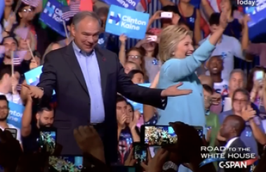 Virginia Sen. Tim Caine on stage with Hillary Clinton for the announcement of his selection as her vice presidential running mate.