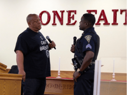Connecticut NAACP President Scot X. Esdaile and New Haven Police Sgt. Shafiq Abdussabar engage in dialogue during a police-community forum in New Haven on July 22. This is one of several such forums that have taken place across Connecticut in the wake of police shootings and the killing of unarmed black men.