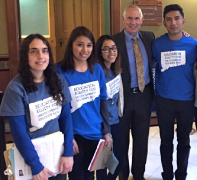 CSCU President Mark Ojakian poses for a picture with so-called "Dreamers" at the state capitol, where he lobbied for undocumented immigrants to get financial aid.