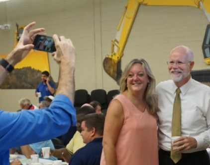 AFT's Jan Hochadel poses Friday with Comptroller Kevin P. Lembo at an AFL-CIO Labor Day event