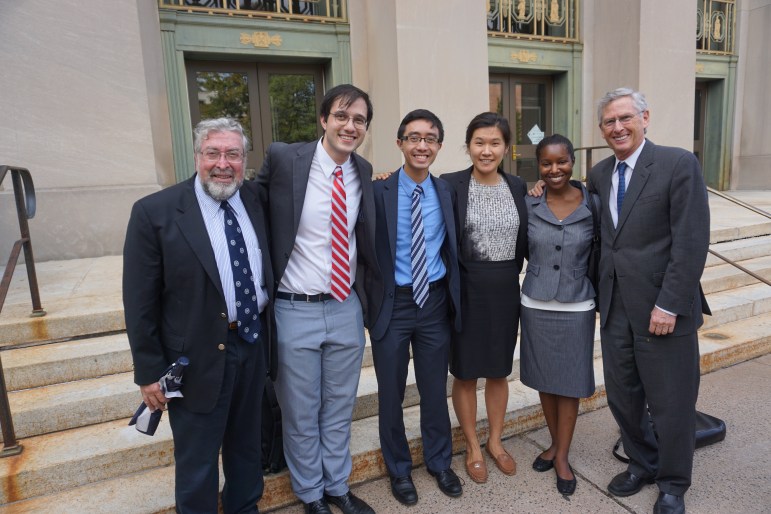 New Haven attorney David Rosen, at right, poses outside Hartford Superior Court with members of his team on the school funding trial. From left, visiting clinical lecturers Alex Knopp and Alex Taubes and Yale law students Eric Chung, Helen Li and Shannon Prince.