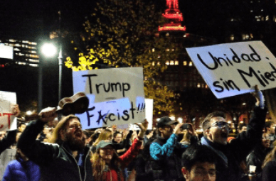 Demonstrators at the Thursday evening rally against Trump in New Haven.