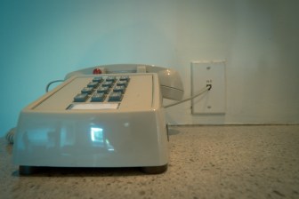 The electronic visit verification system requires home care workers to call in when they arrive at a client's house, using a landline phone or app that shows where they are.