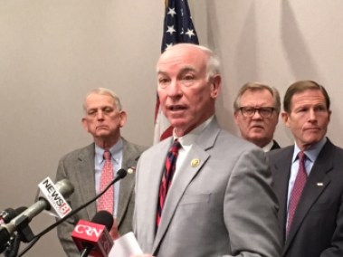 U.S. Rep. Joe Courtney voices objections to realignment of the shoreline rail route. Left to right, behind Courtney are Stonington First Selectman Rob Simmons, State Sen. Paul Formica and U.S. Sen. Richard Blumenthal.