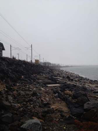 Storm Sandy washed out the boulders fortifying the embankment supporting the rail line in Niantic and separating it from Long Island Sound, on the right.