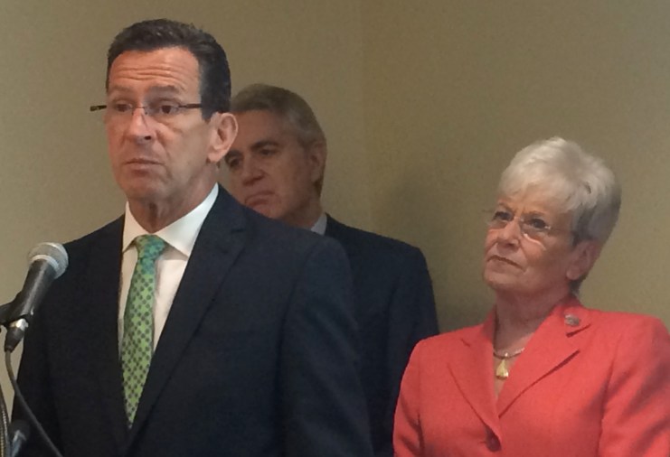 Gov. Dannel P. Malloy, Access Health CT CEO Kevin Counihan and Lt. Gov. Nancy Wyman announced data they said showed a drop in the uninsured rate earlier this month.