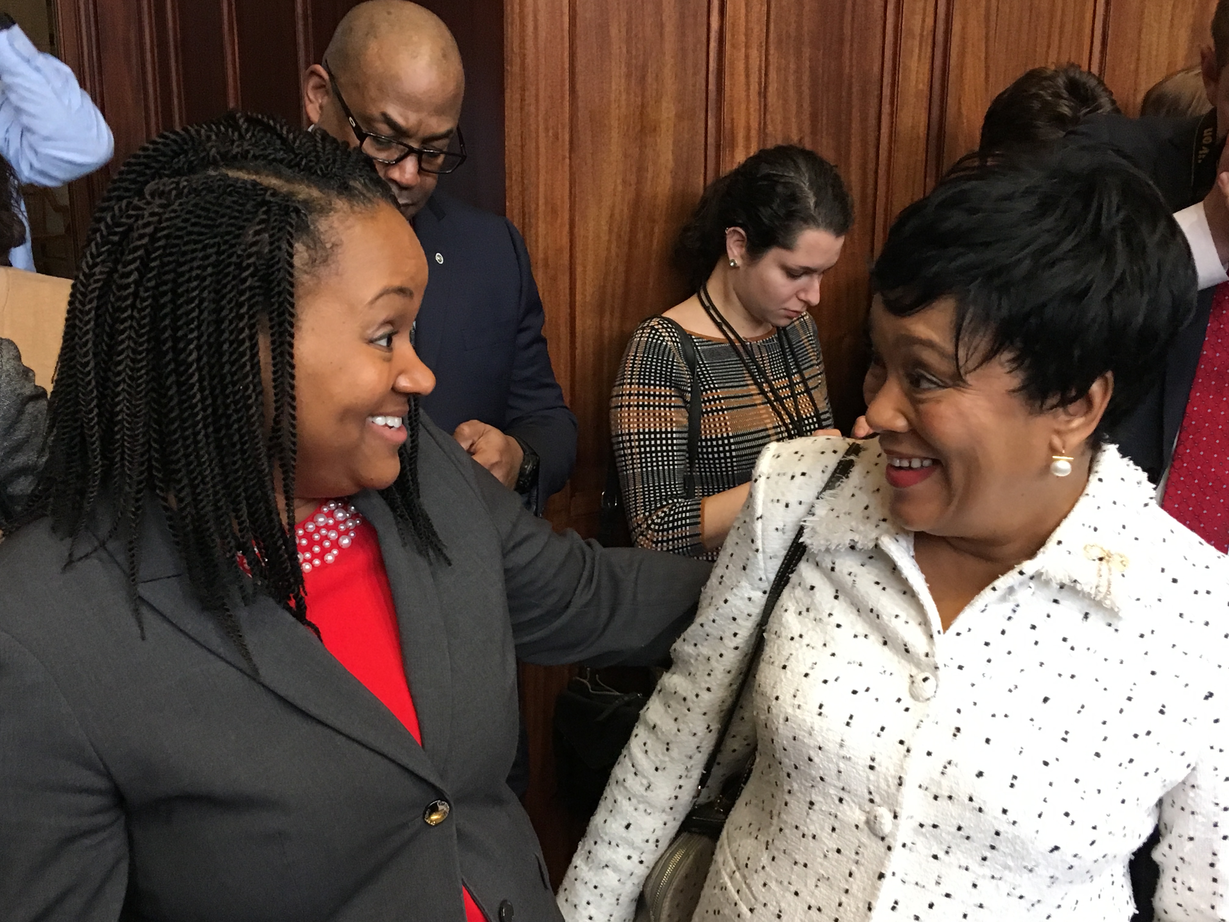 Melissa McCaw (left), the new state budget director, greets New Haven Mayor Toni Harp (Keith M. Phaneuf / CTMirror.org )