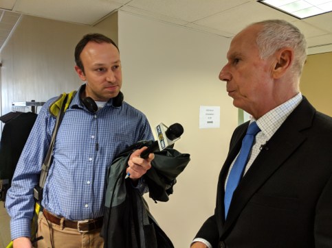 CSCU President Mark Ojakian talked to reporters, including WTIC reporter, Aaron Kupec, following vote to raise tuition at state universities by 5 percent.