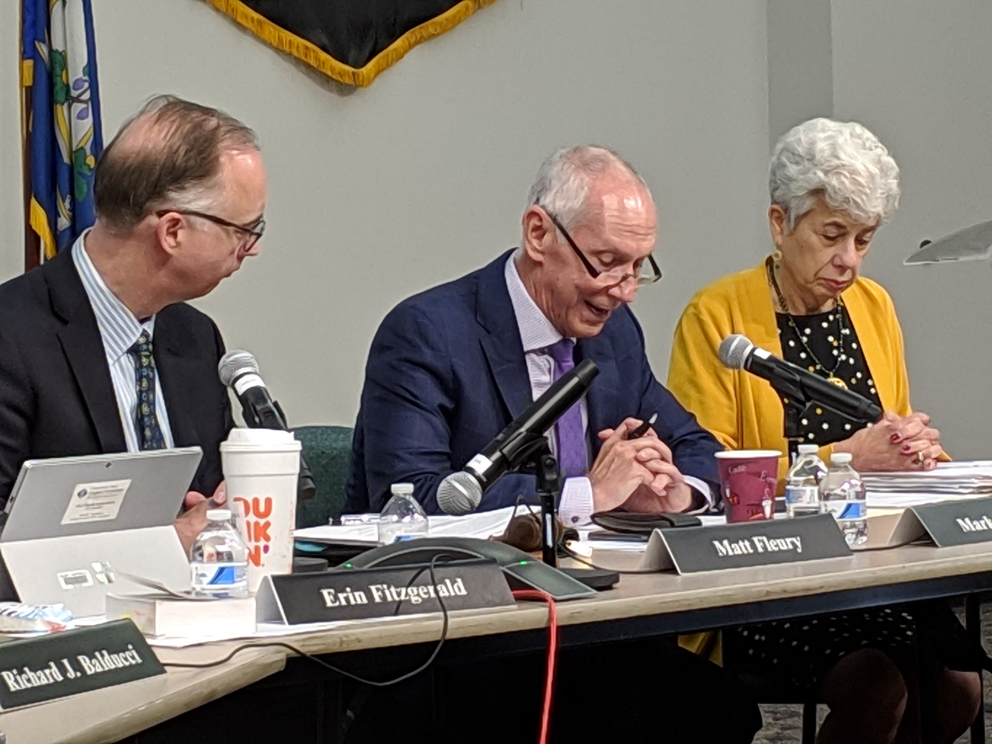 Connecticut State University President Mark Ojakian talks about the three regional presidents hired Thursday at a Board of Regents for Higher Education meeting. To his left is Regent Merle Harris and to his right is Matt Fleury, the chairman of the Board of Regents.