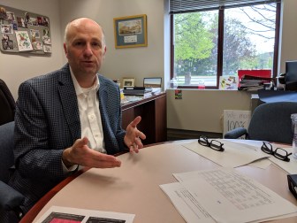 Rep. Gregg Haddad, D-Mansfield and co-chairman of the higher education committee, talked about a free college proposal in office recently.