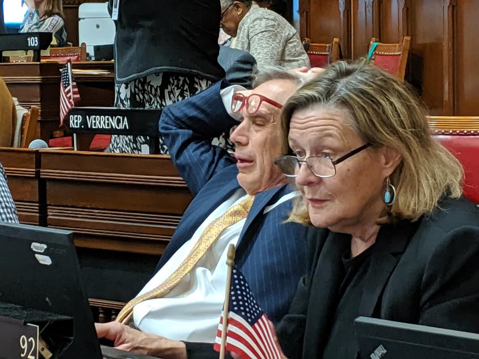 Rep. Peter Tercyak, D-New Britain, takes a breather in final hour of Wednesday session. Rep. Pat Dillon, D-New Haven, is at right.