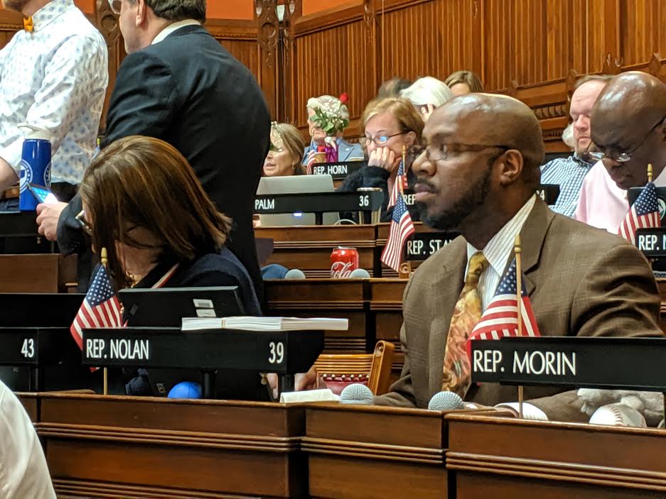 Rep. Anthony Nolan, D-New London, in the midst of a vote late Wednesday night.