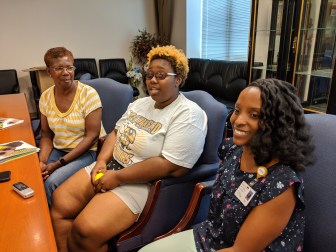 When Vatrece Williams-Galindez's daughter, Paisley, was acting up in pre-school, Angelica Thompson, right came in to help through the Early Childhood Consultation Partnership program. Thompson worked with Williams-Galindez and with the child's teacher, Shirley Leslie, at left, along with others.