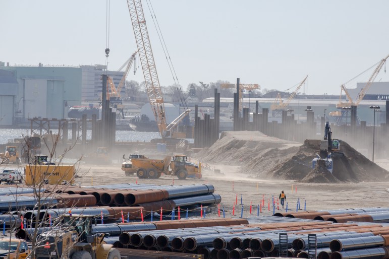 Construction machinery on a sandy field