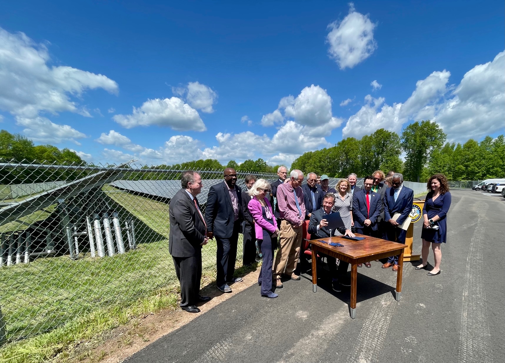 Gov. Ned Lamont speaks at a solar array outside the Bloomfield Board of Education.