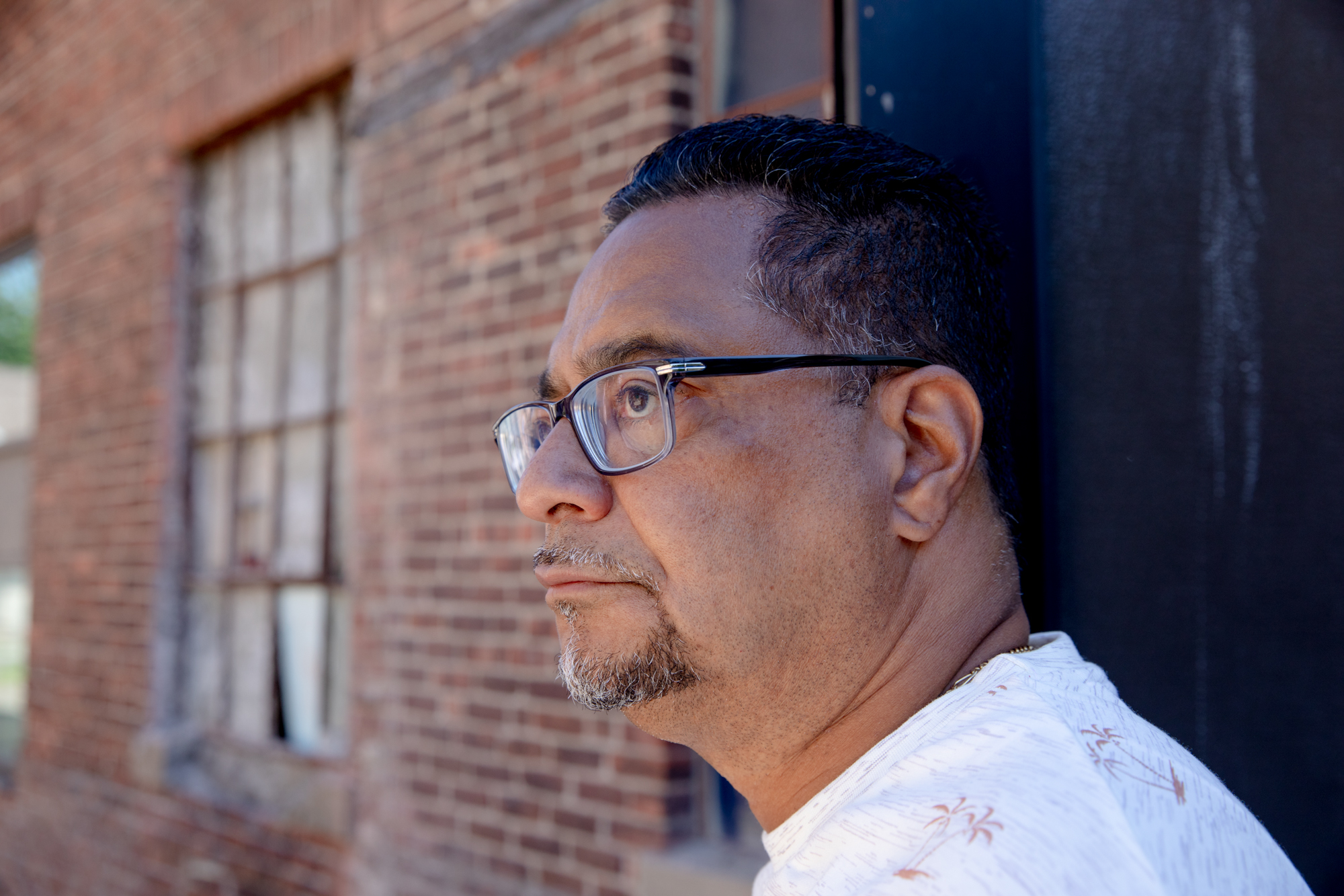 Geraldo Reyes, D-Waterbury, the chair of the Black and Puerto Rican Caucus (BPRC), listens to a business owner in Southend Waterbury. BPRC supported Connecticut's baby bond program, which was created in 2021 but didn't get funding in 2022.