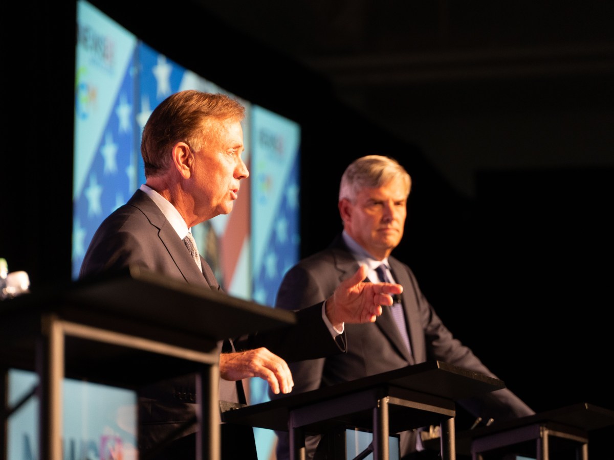Democratic Gov. Ned Lamont and Republican Bob Stefanowski on stage during the debate.