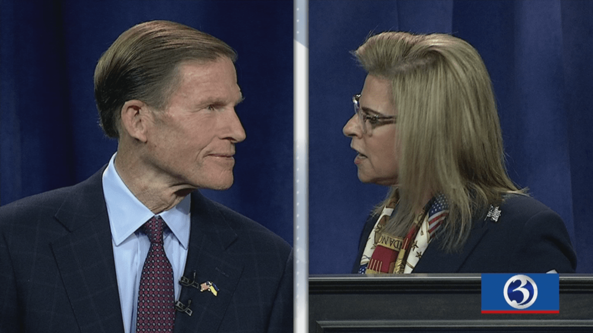 Richard Blumenthal and Leora Levy on stage at the debate.