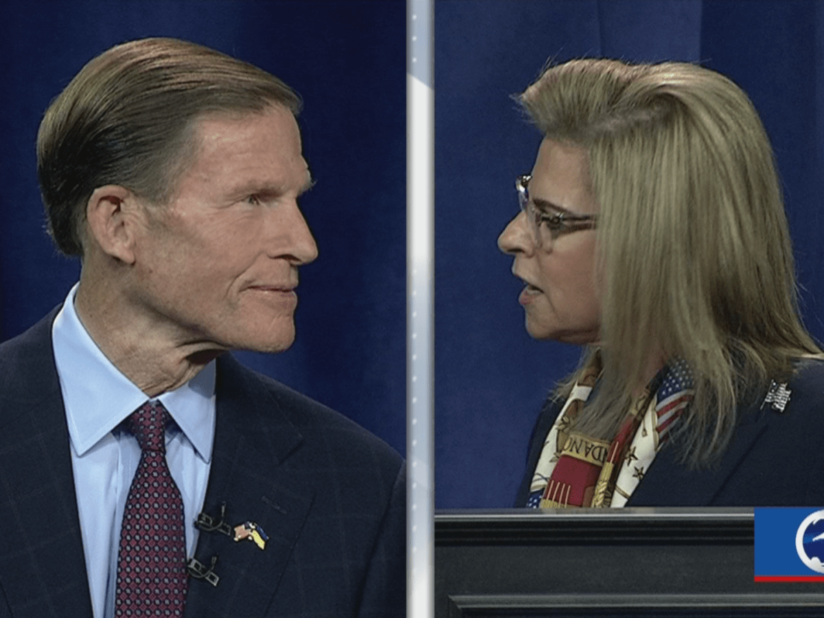 Richard Blumenthal and Leora Levy on stage at the debate.