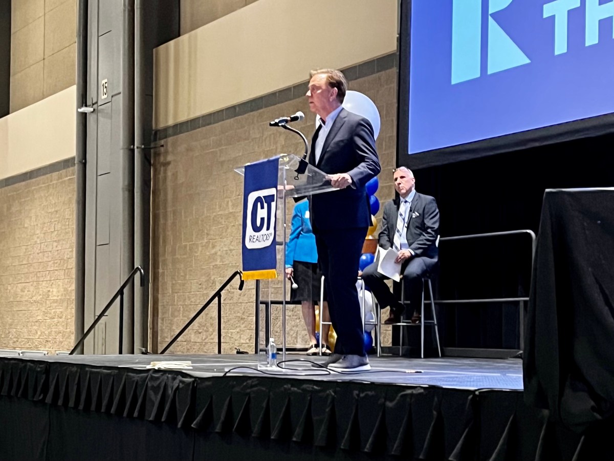Gov. Ned Lamont speaks on Monday, May 15, 2023, to a conference of the Connecticut Association of Realtors.