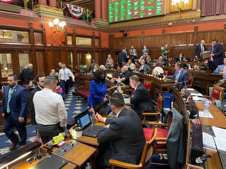 Legislators at work in the Connecticut House chamber.
