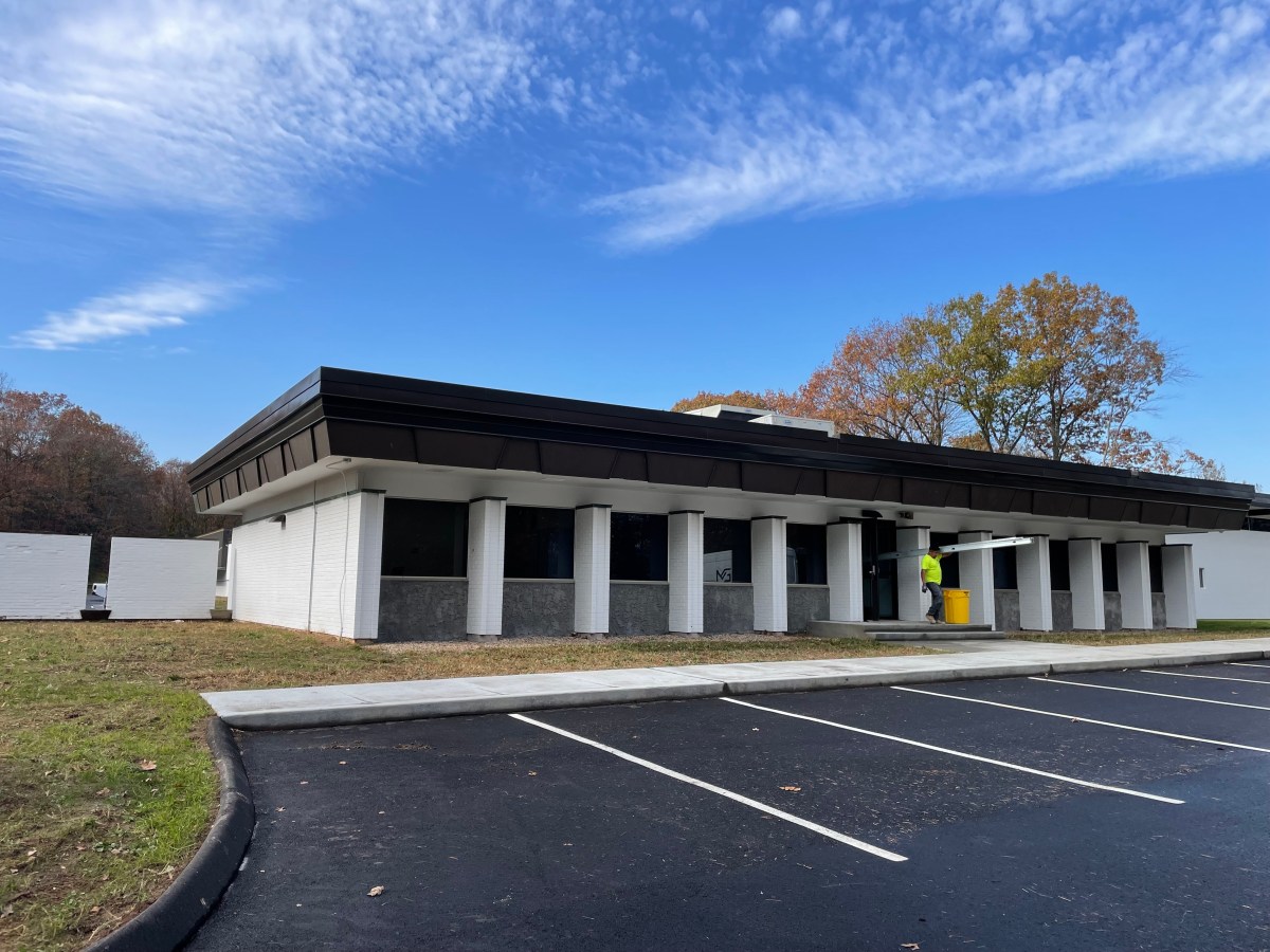 The front facade of a manufacturing building.