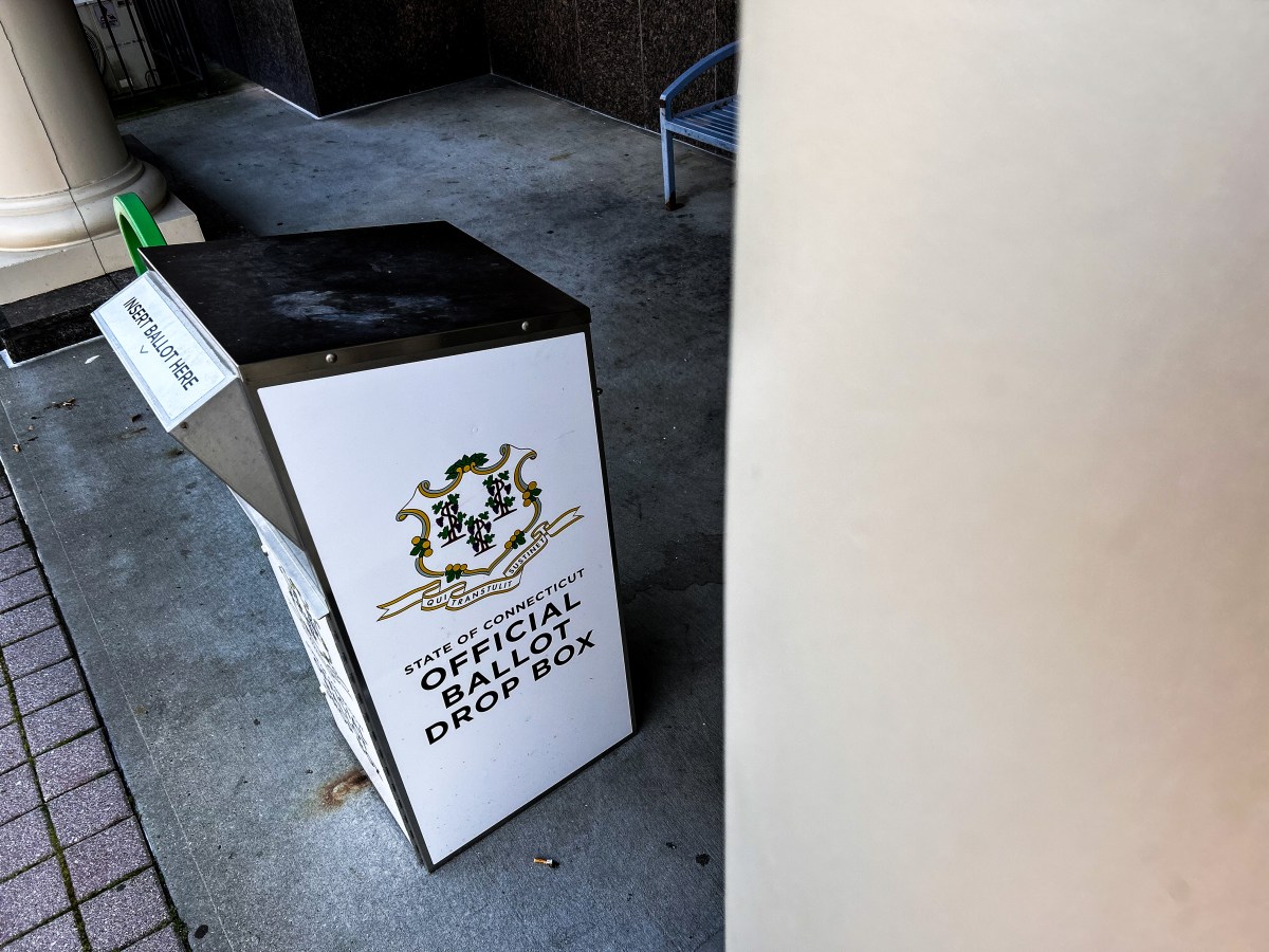 A white and black ballot drop box that says "State of Connecticut Official Ballot Drop Box."