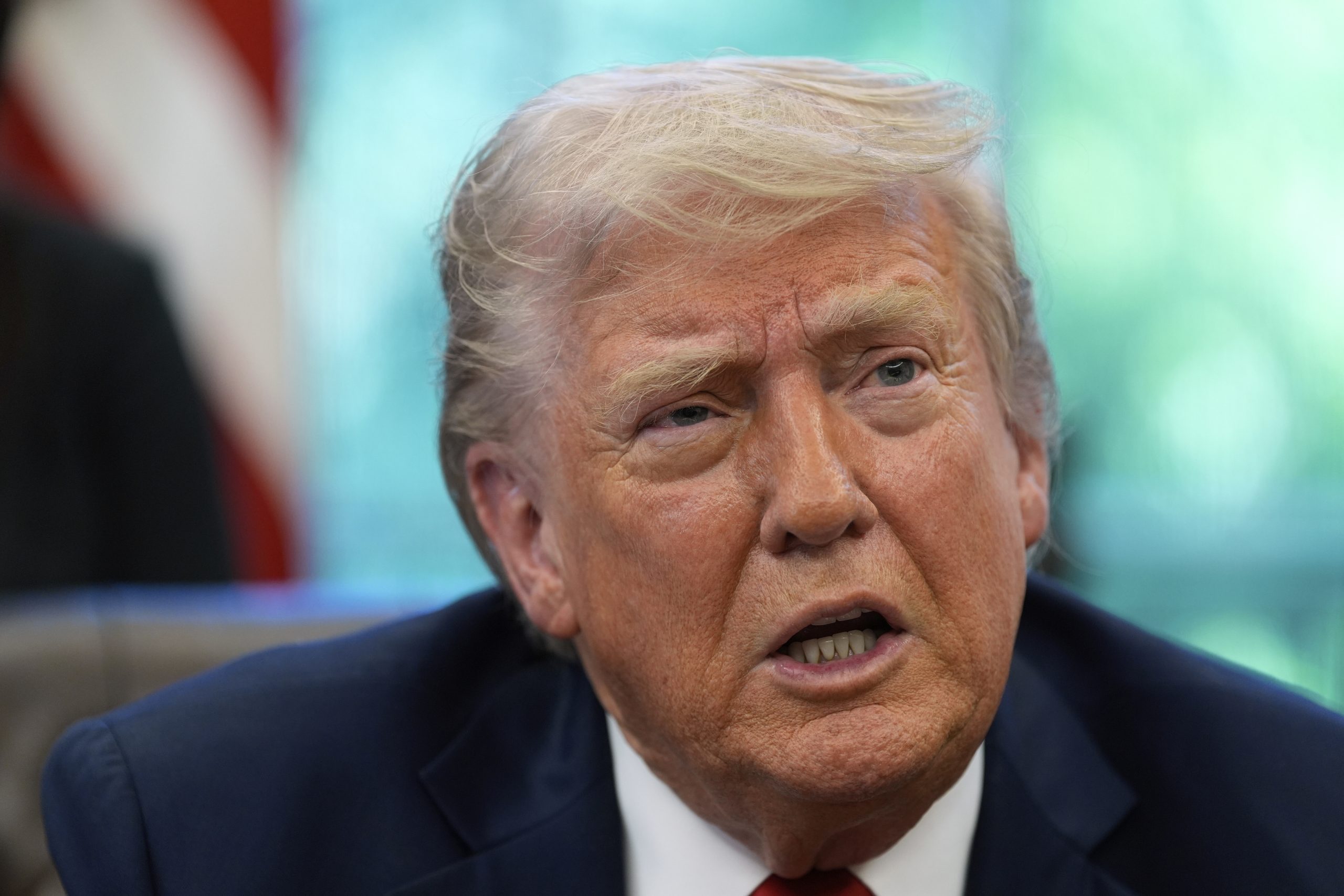 What to know about Trump’s draft proposal to curtail state AI regulations