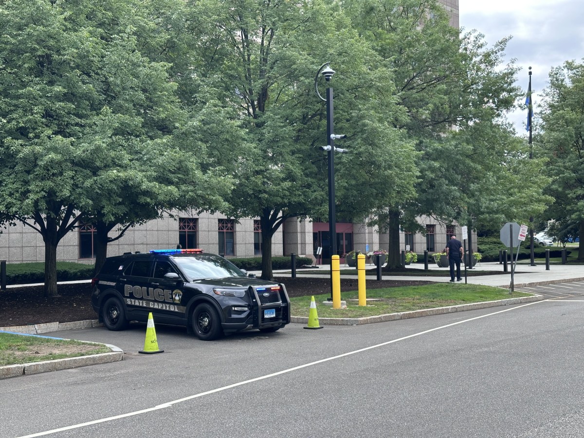 Quickly closed window shields CT Capitol cop from knife attack